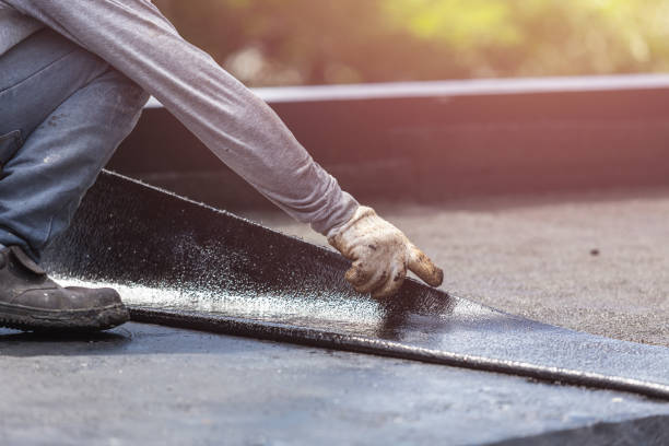 Professional Basement Waterproofing technician working in Eaton, OH